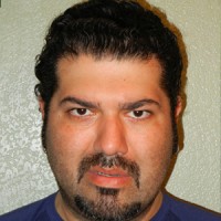 Benito Flores Man with short dark hair and facial hair